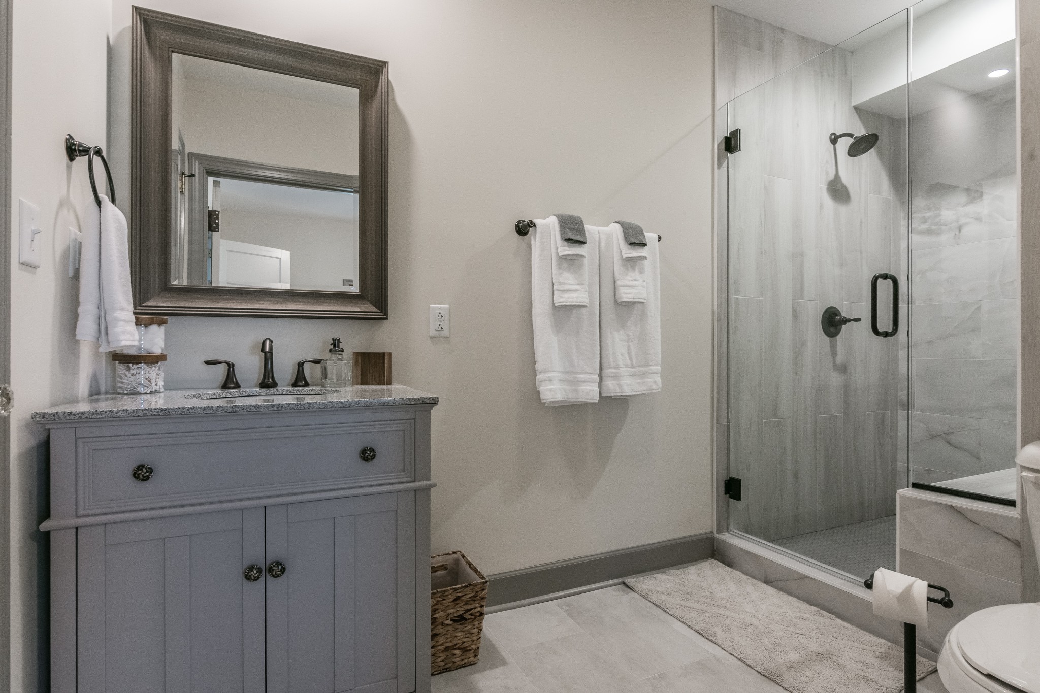 7159 Whites Creek Pike Joelton, TN 37080 - Photo 13 of 24 a bathroom with a sink vanity granite toilet and shower