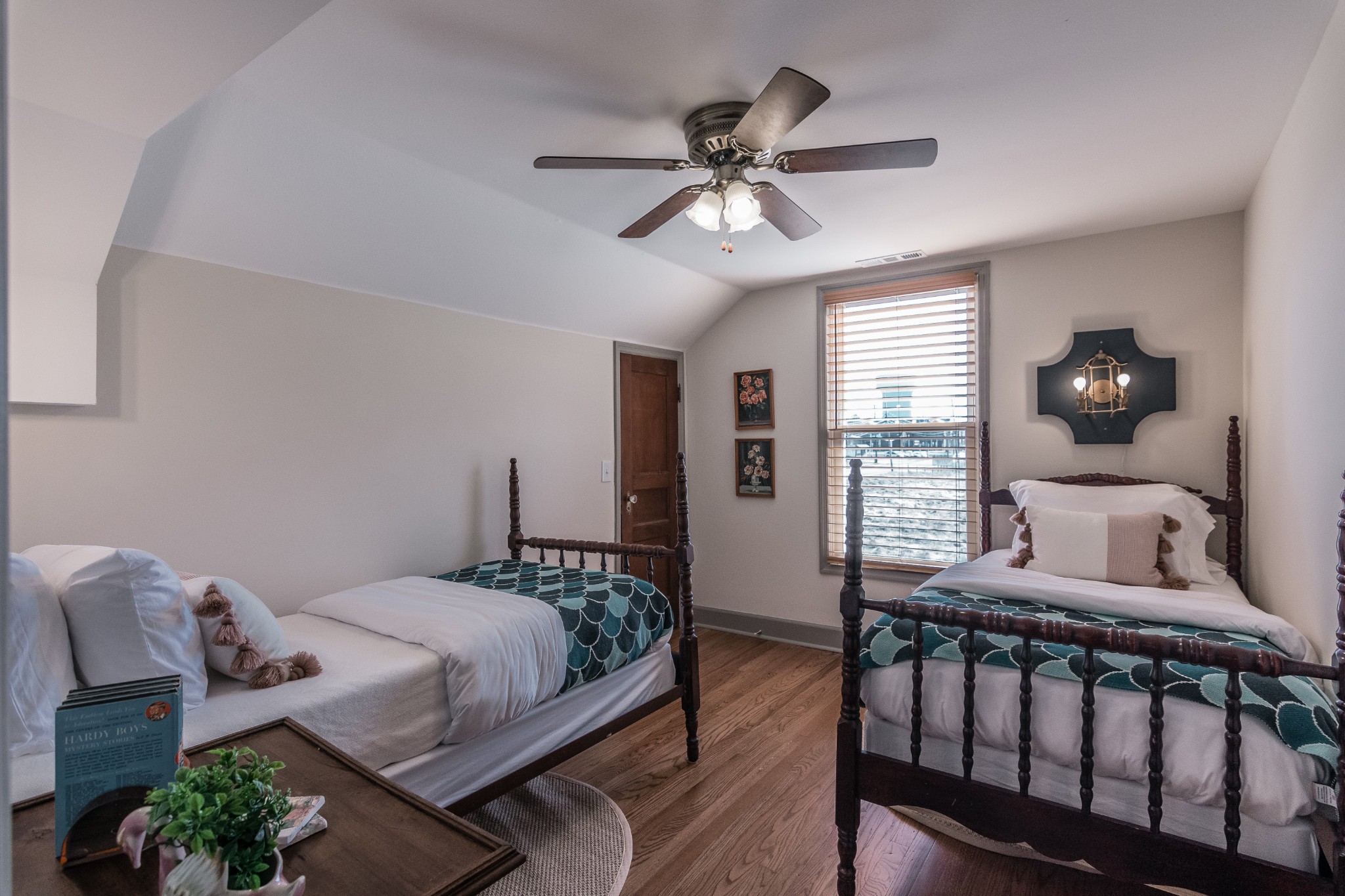 7159 Whites Creek Pike Joelton, TN 37080 - Photo 20 of 24 a bedroom with a bed and wooden floor