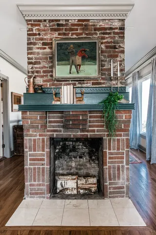 a fireplace with wooden floor