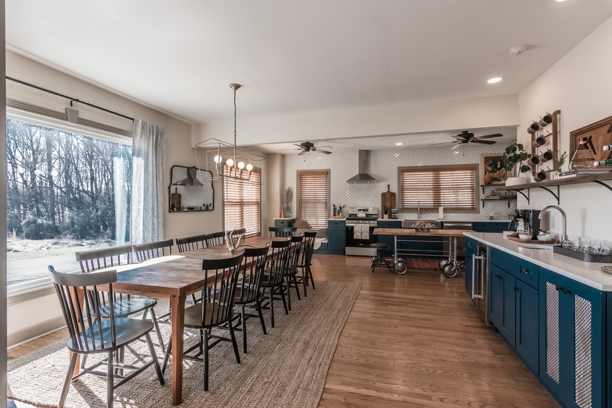 7159 Whites Creek Pike Joelton, TN 37080 - Photo 7 of 24 a kitchen with lots of wooden furniture a sink a dining table and chairs