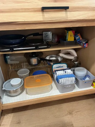 a kitchen with a stove and a refrigerator