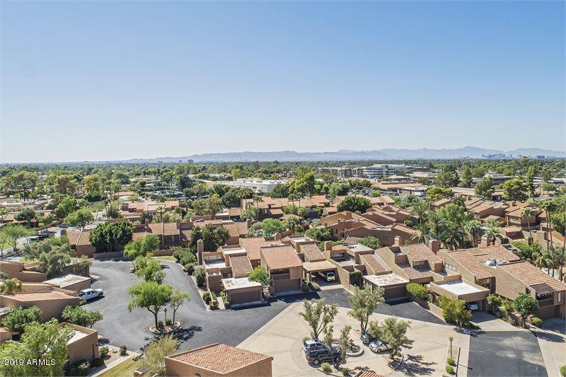 4438 East Camelback Road, Unit 143 Phoenix, AZ 85018 - Photo 29 of 30 an aerial view of a city with lots of residential buildings