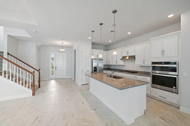a view of kitchen and windows