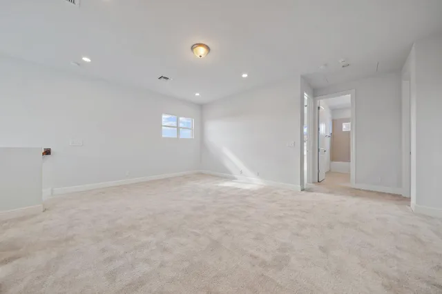 a view of a dining room with furniture wooden floor and chandelier