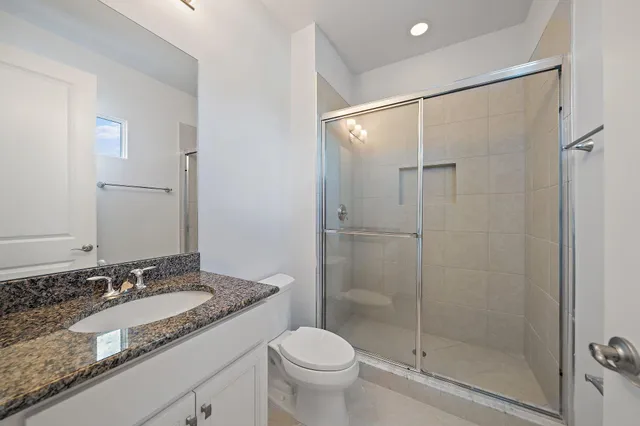 a front view of a house with a yard and fountain