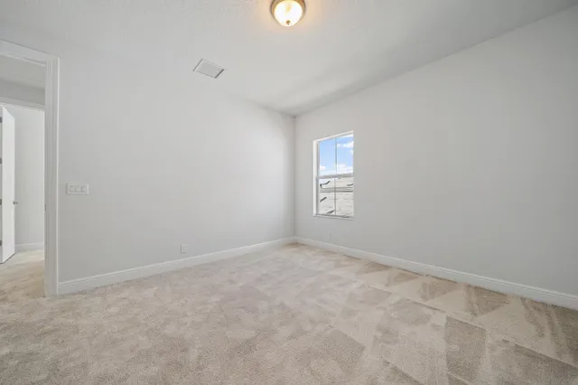 a view of swimming pool with a garden and seating area