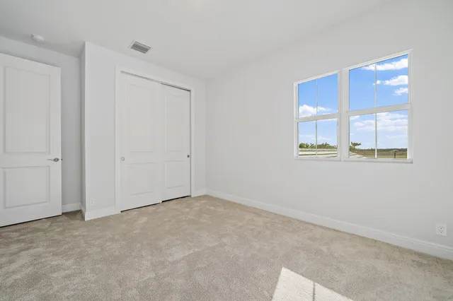 a view of a backyard with a patio