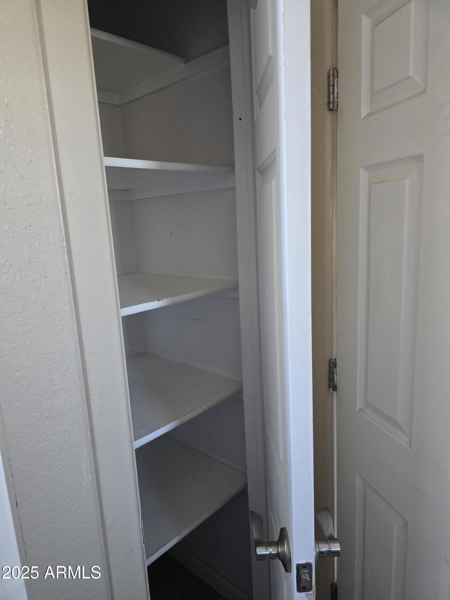 240 East Oak Street Huachuca City, AZ 85616 - Photo 14 of 43 master bath linen closet