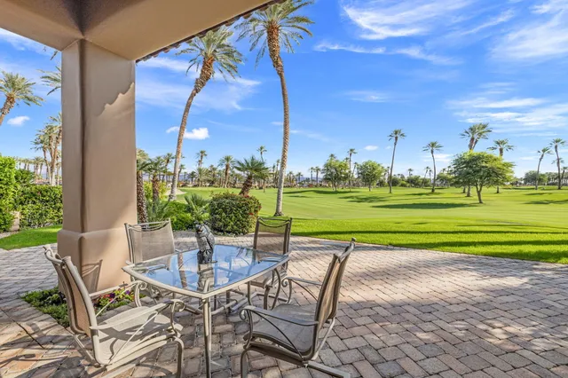 a utility room with a stove and a yard