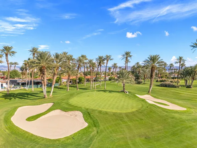 a view of a playground with a swimming pool