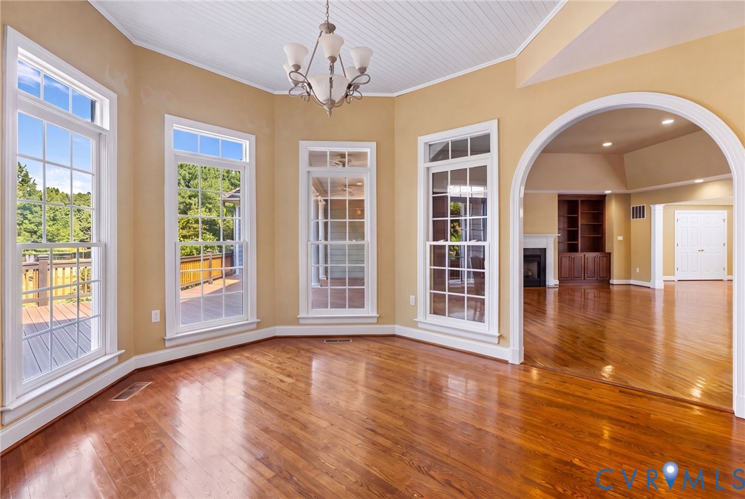 2365 State Rte 635 Midlothian, VA 23113 - Photo 59 of 64 Hardwood flooring, arched doorway, coffered ceilin