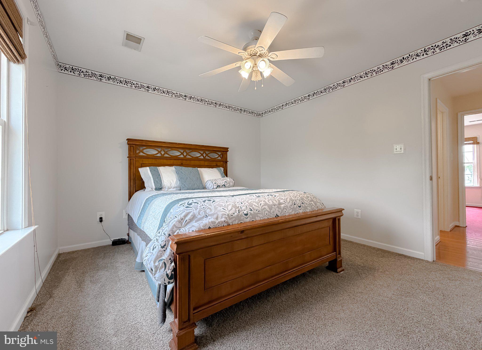 6191 Hallowing Point Road Prince Frederick, MD 20678 - Photo 53 of 73 Serene bedroom with natural light.