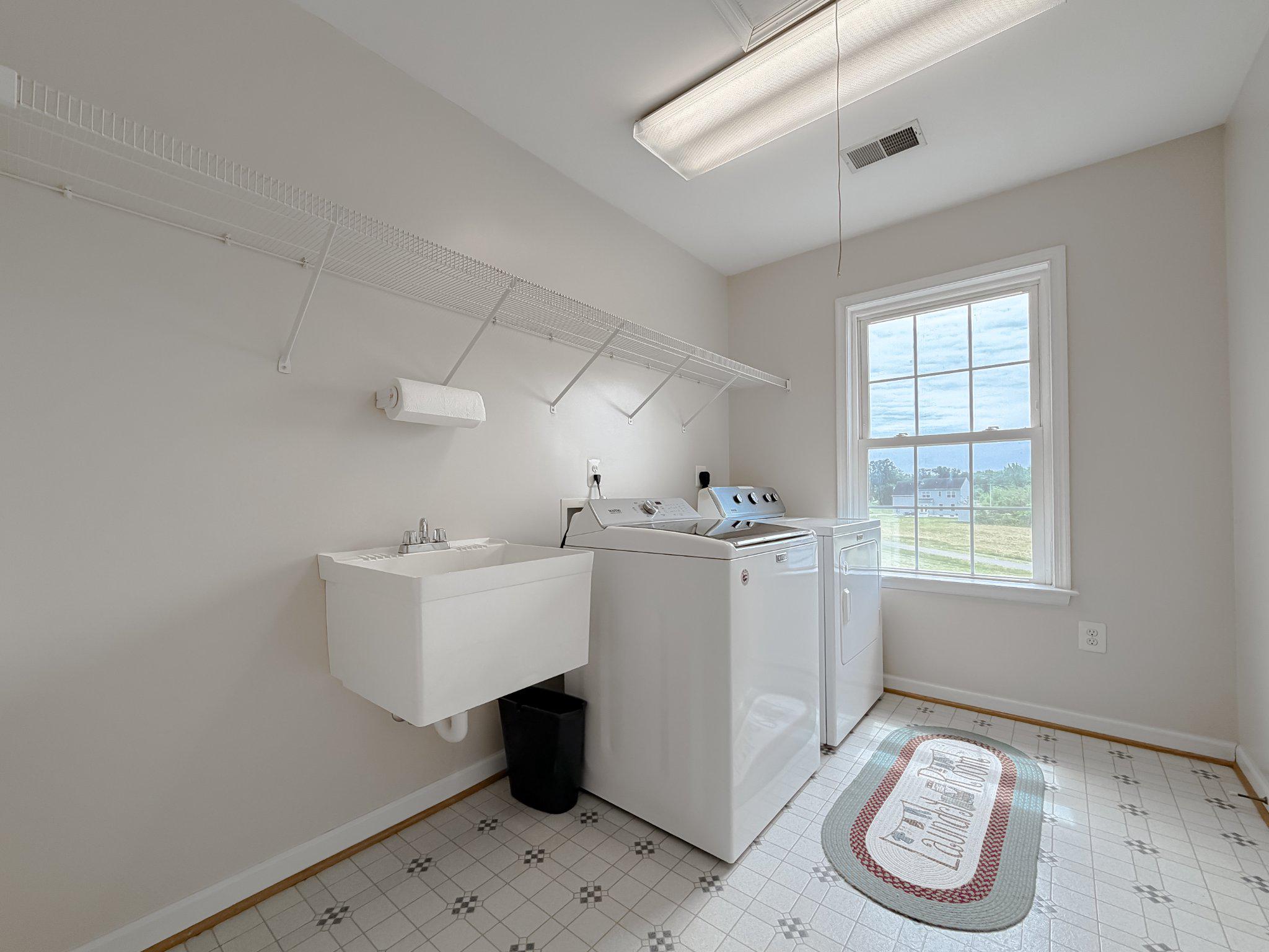6191 Hallowing Point Road Prince Frederick, MD 20678 - Photo 57 of 73 Upstairs laundry with large linen closet