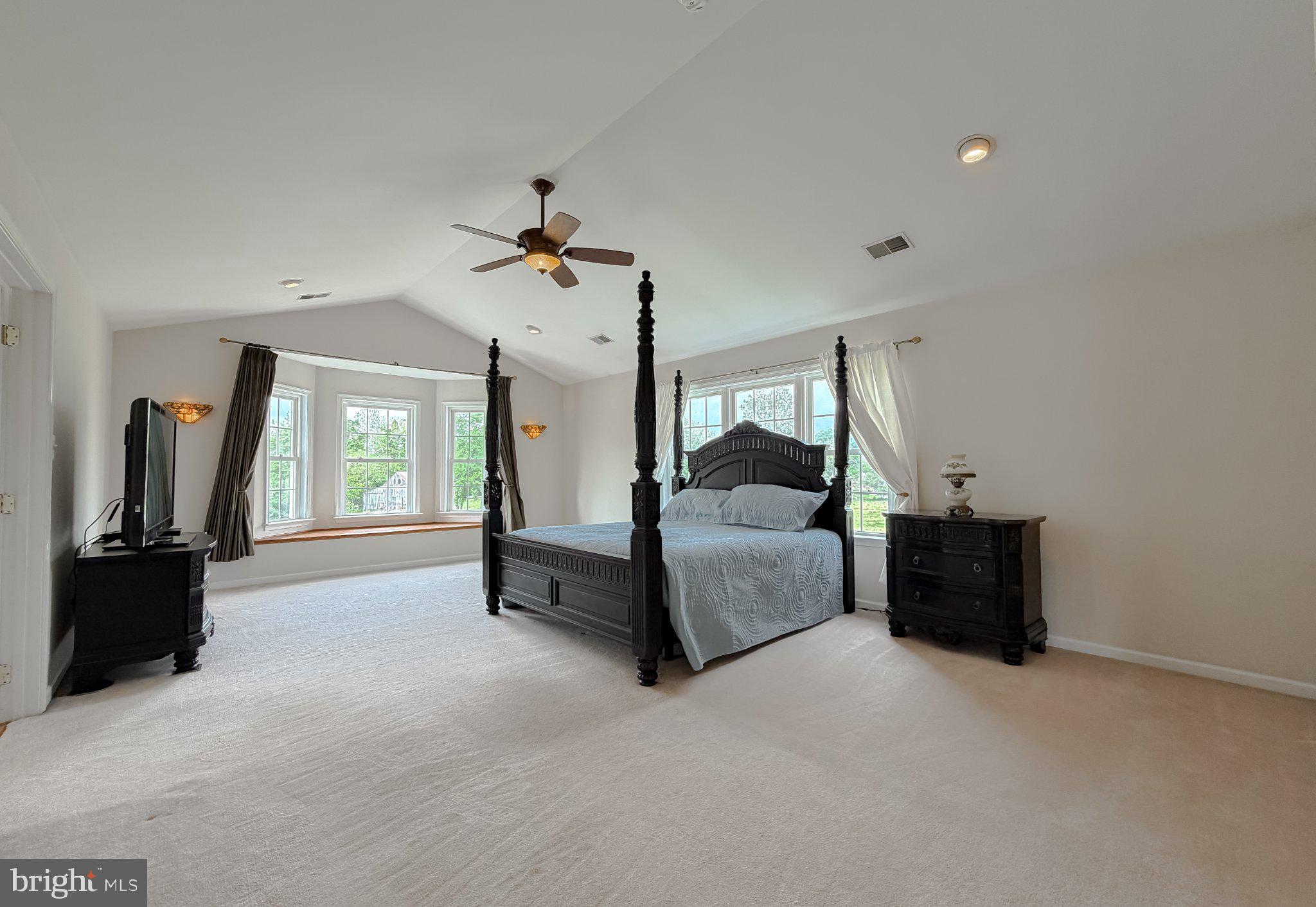 6191 Hallowing Point Road Prince Frederick, MD 20678 - Photo 58 of 73 Spacious bedroom with elegant charm.