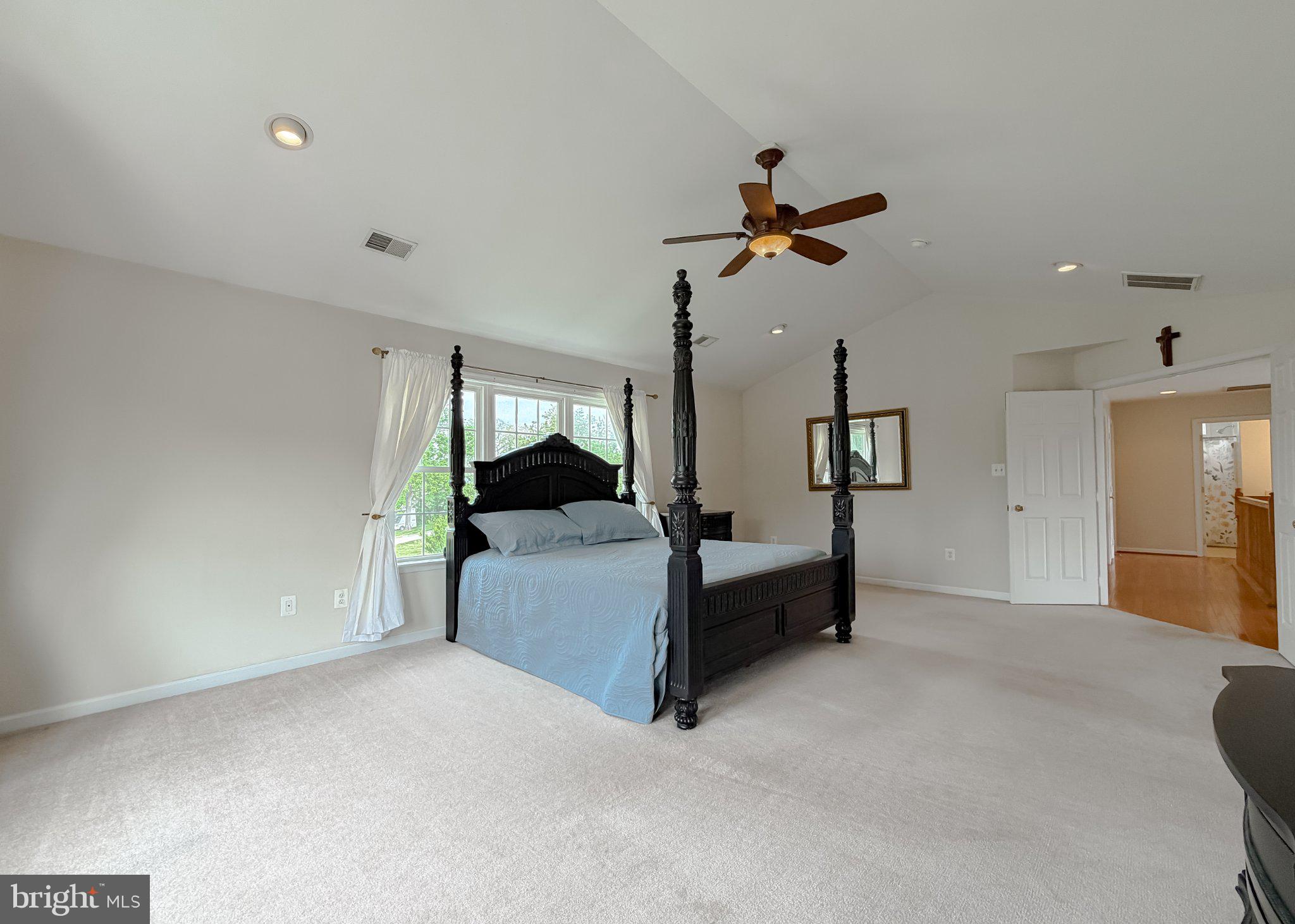 6191 Hallowing Point Road Prince Frederick, MD 20678 - Photo 61 of 73 Spacious bedroom with elegant charm.
