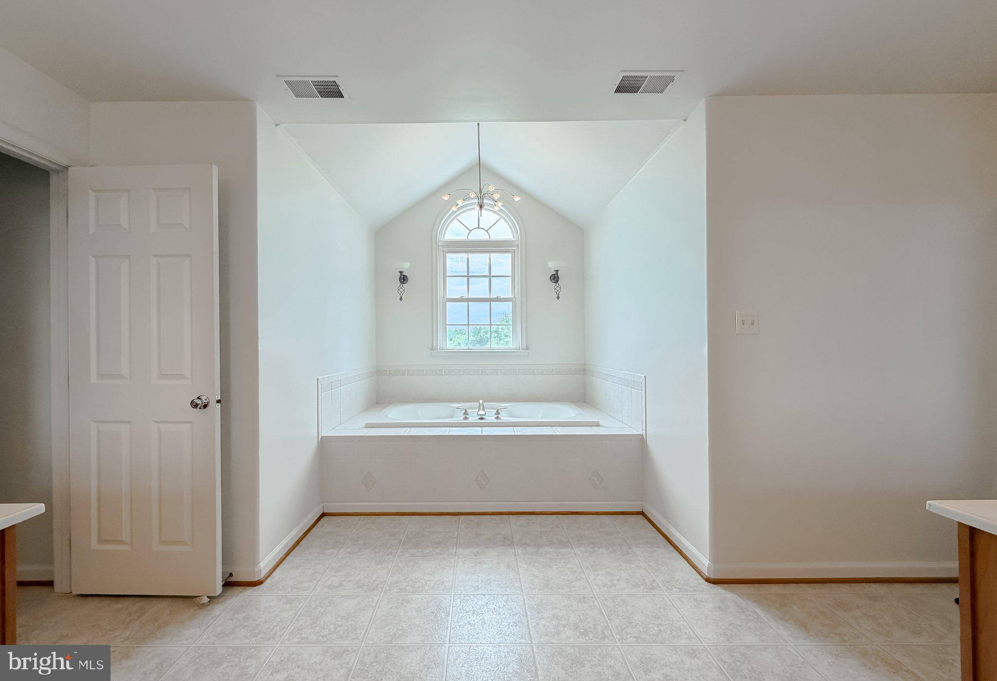 6191 Hallowing Point Road Prince Frederick, MD 20678 - Photo 64 of 73 Serene bathroom with elegant architecture.