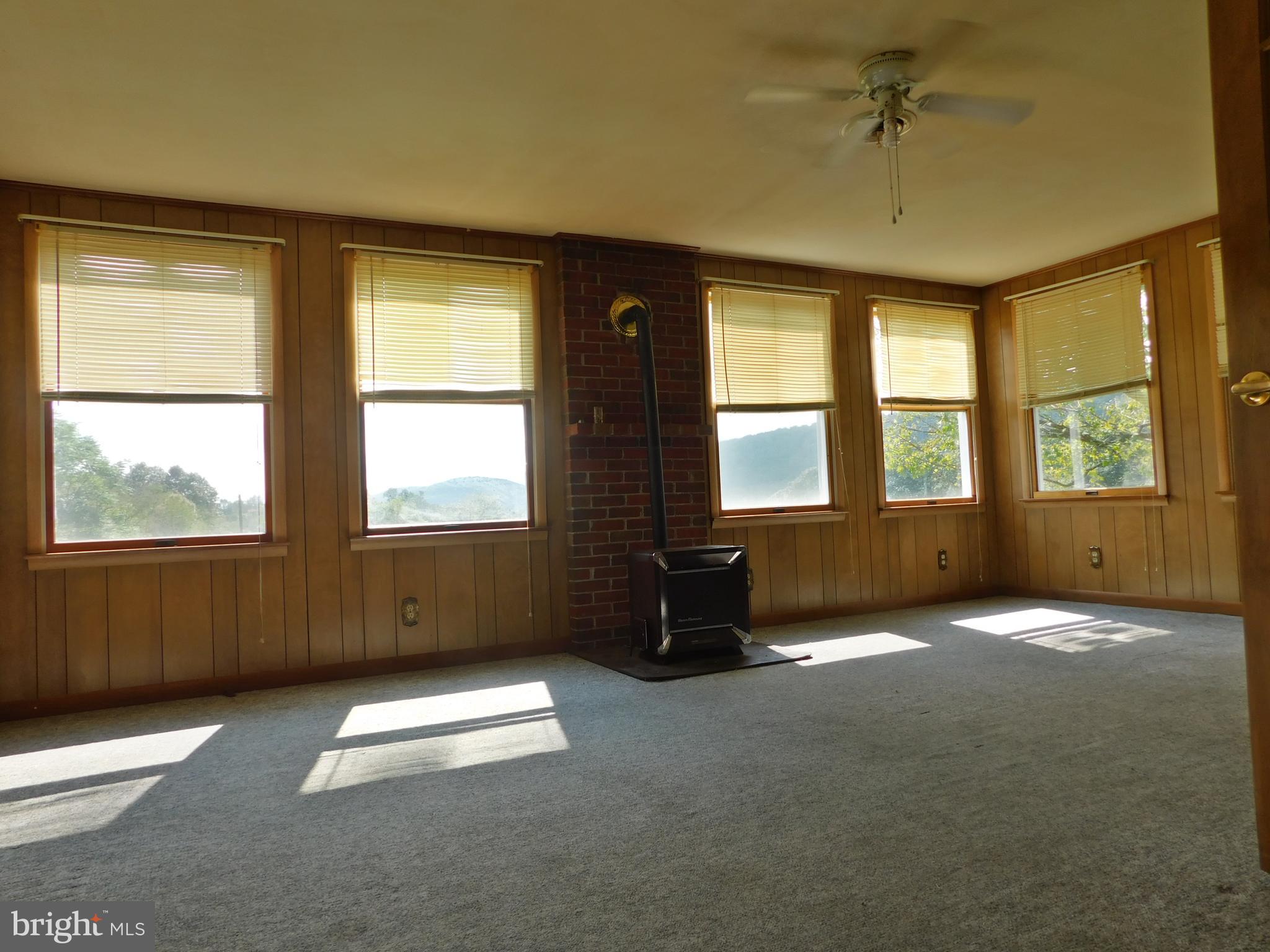 104 Tabor Road Berkeley Springs, WV 25411 - Photo 14 of 27 4 Season Sun Room enjoy the mountain views