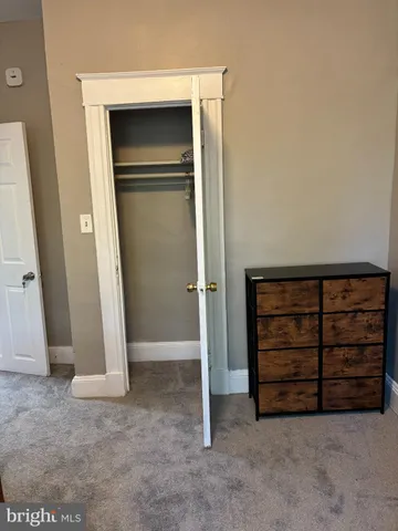 an empty room with a closet