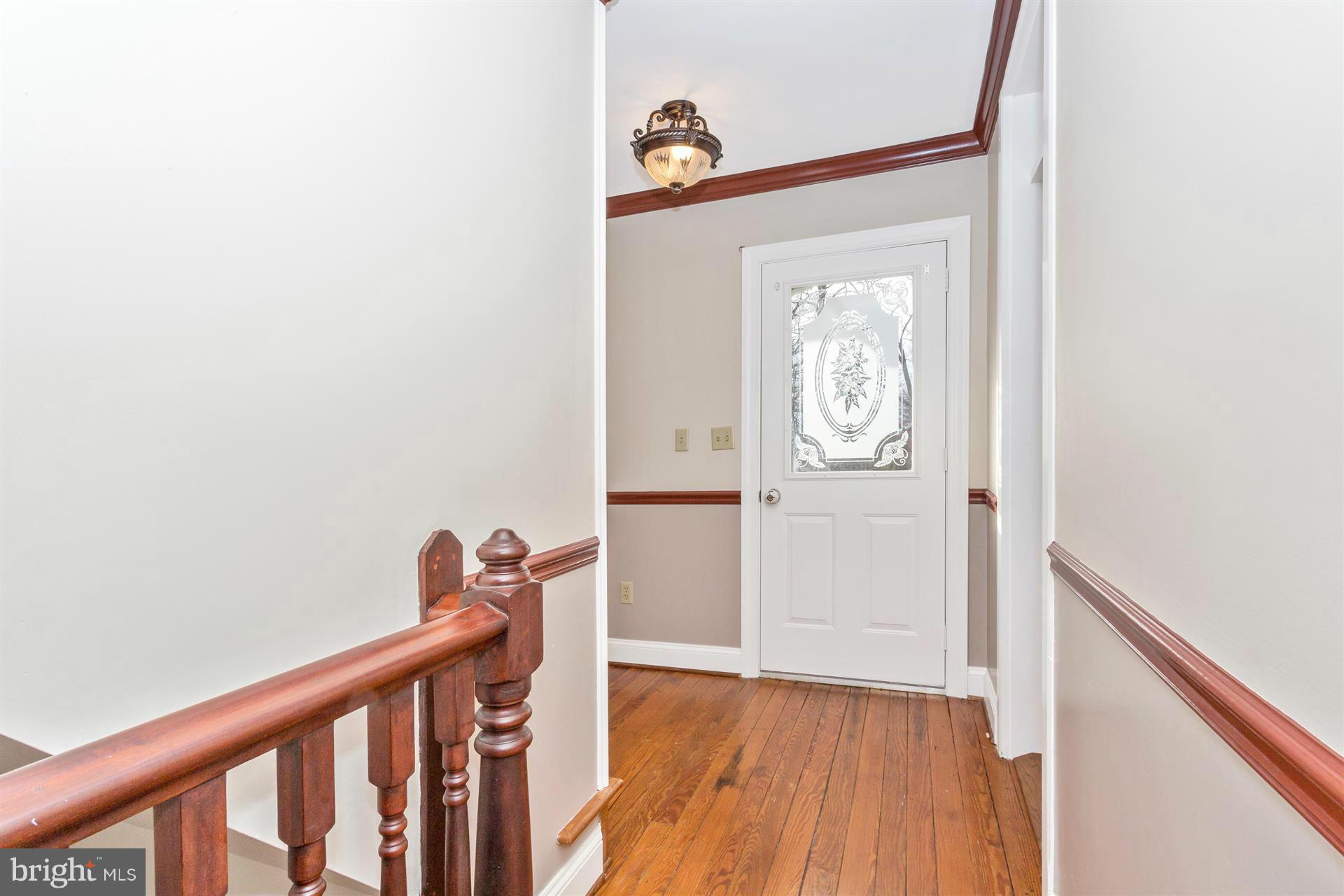 5025 Harney Road Taneytown, MD 21787 - Photo 20 of 30 2nd floor hallway and door to 2nd floor porch