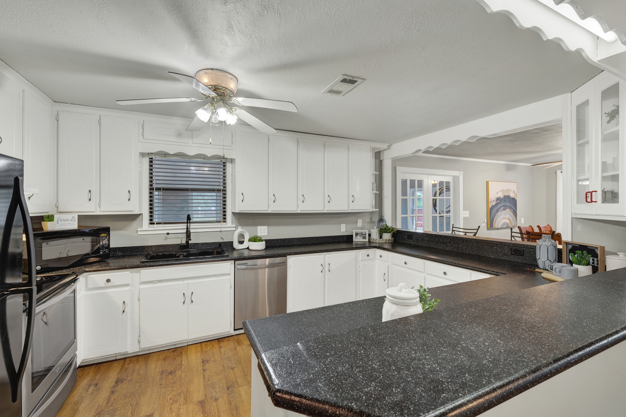 580 East Zipp Road New Braunfels, TX 78130 - Photo 8 of 45 Plenty of cabinets over head. New Dishwasher(2024)