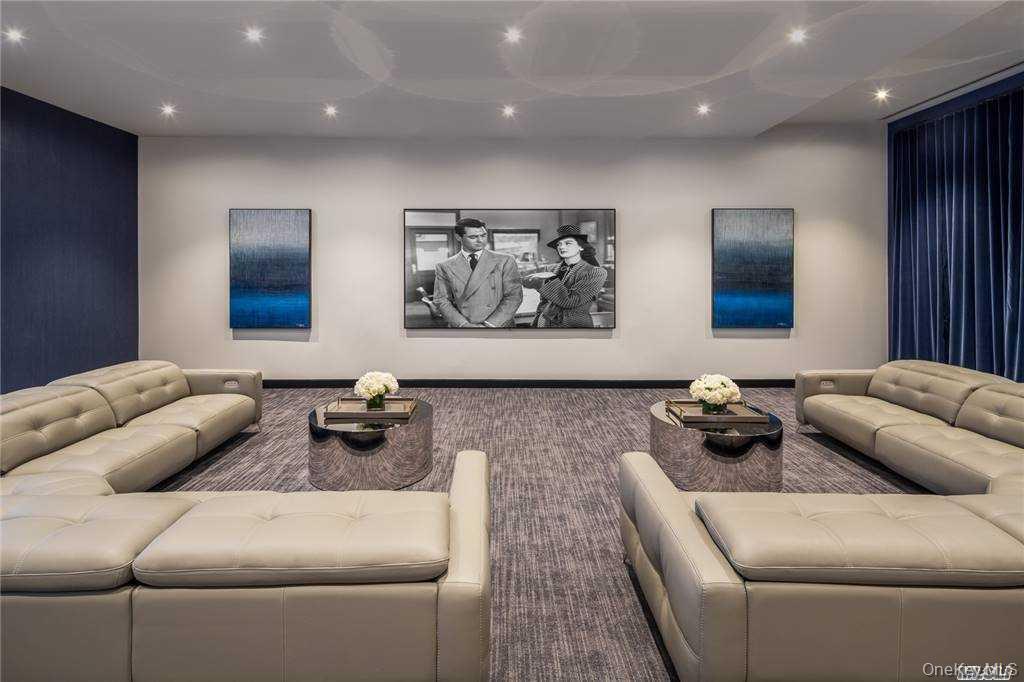 100 Garvies Point Road, Unit 1202 Glen Cove, NY 11542 - Photo 13 of 14 Cinema room featuring recessed lighting and carpet flooring