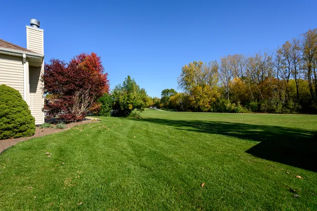 an empty room with a ceiling fan
