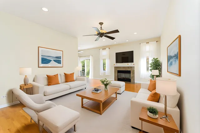 a living room with furniture fireplace and a flat screen tv