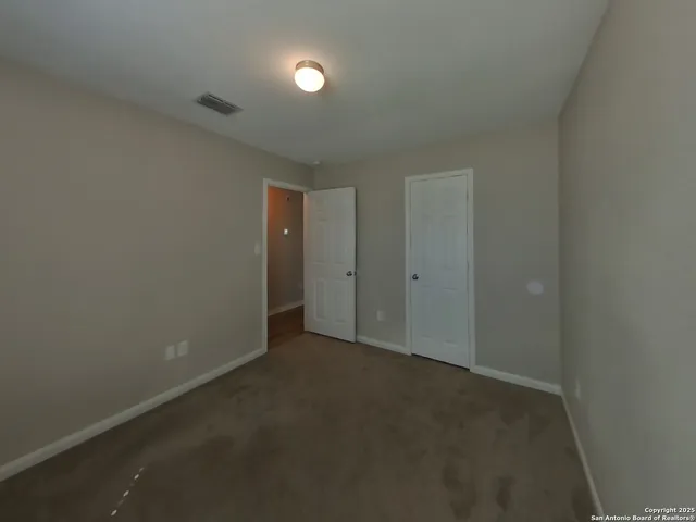 an empty room with an entryway