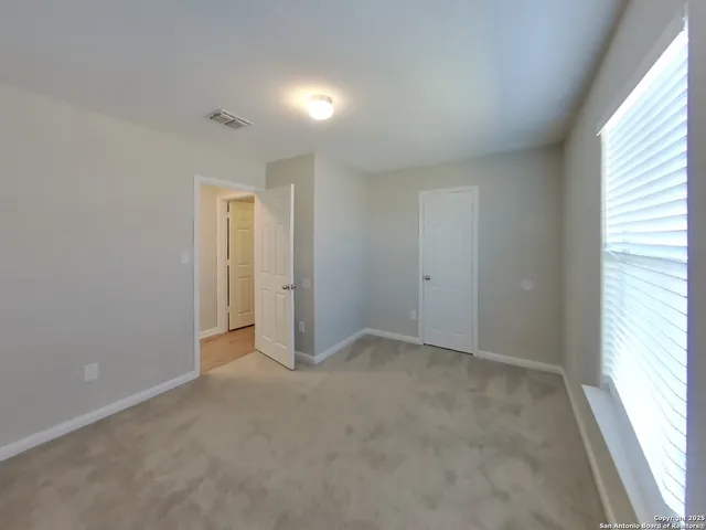 an empty room with a window