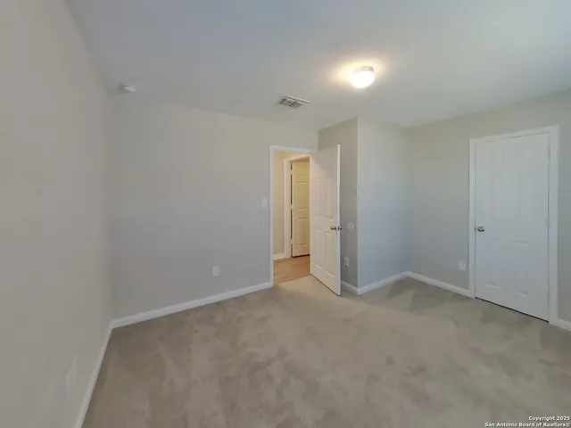 an empty room with an entryway