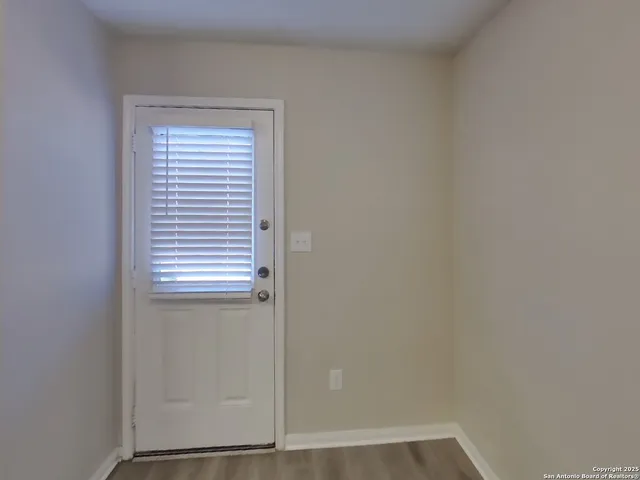 a view of a small space with a window