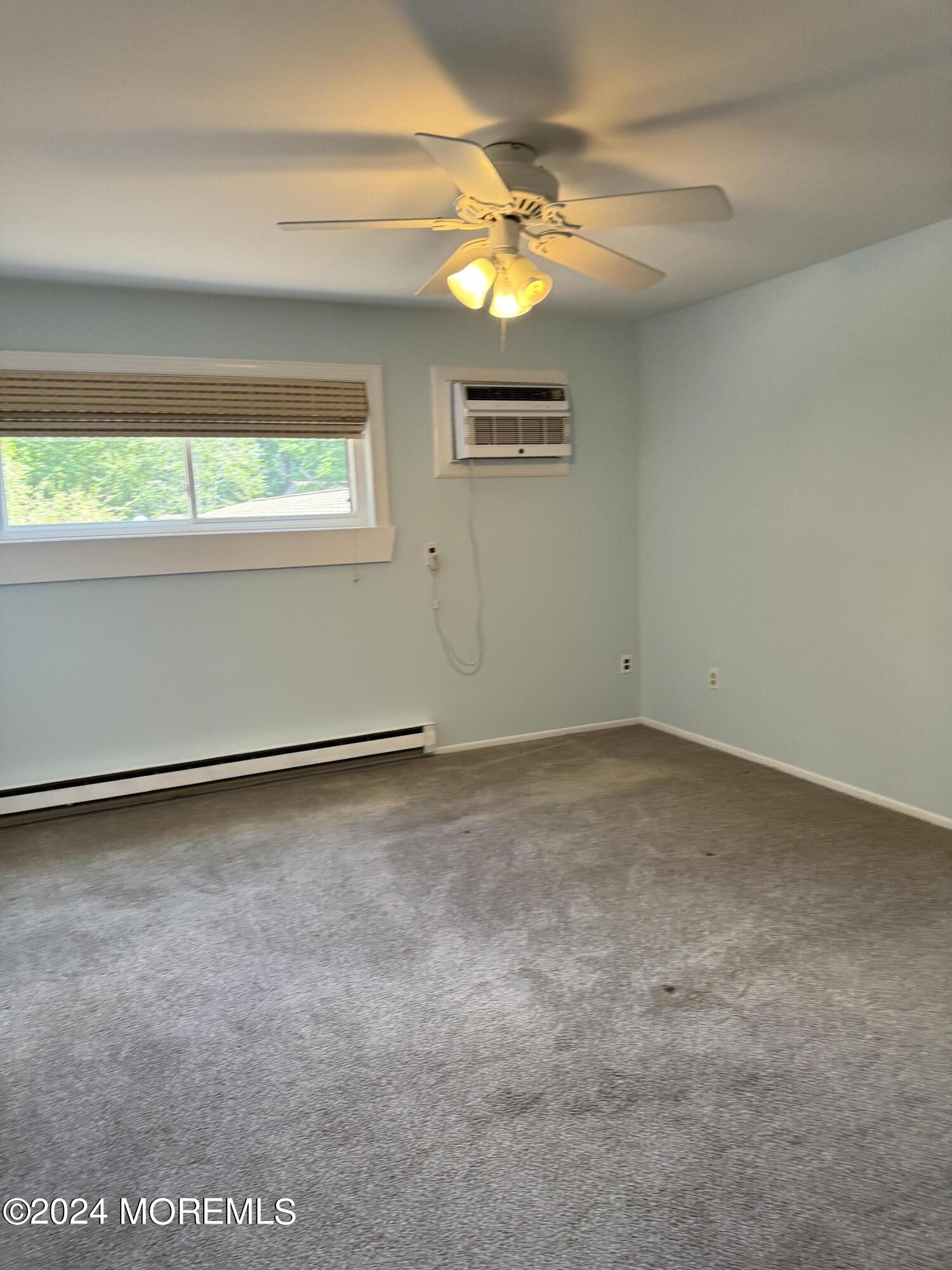 95 Lexington Court Red Bank, NJ 07701 - Photo 10 of 26 an empty room with a window