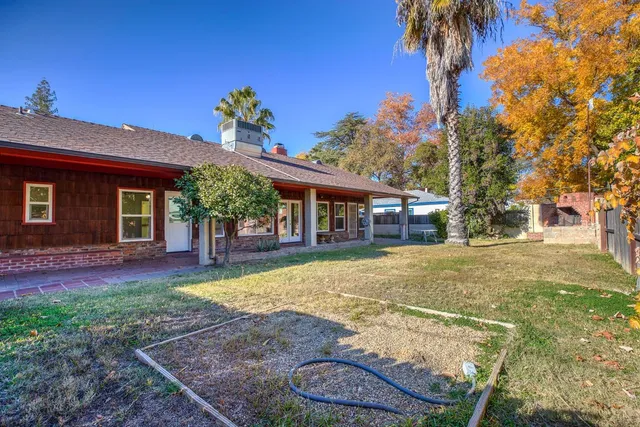 a swimming pool with wooden fence