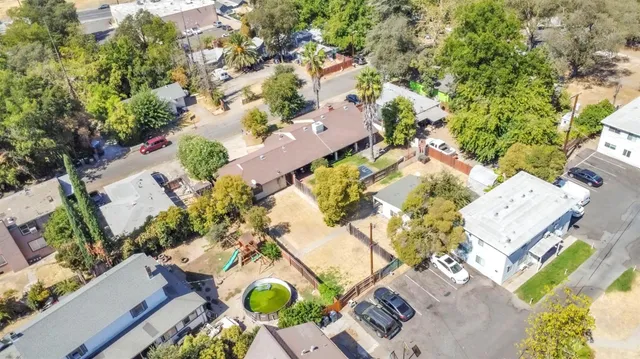 an aerial view of residential house with outdoor space