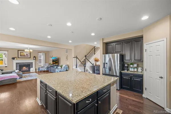 a kitchen with a stove a refrigerator and a stove