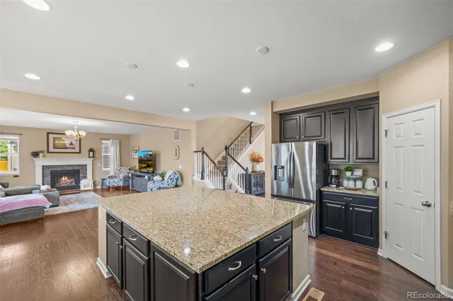 a kitchen with a stove a refrigerator and a stove