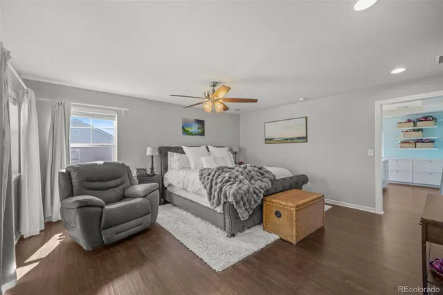 a bedroom with furniture and a couch