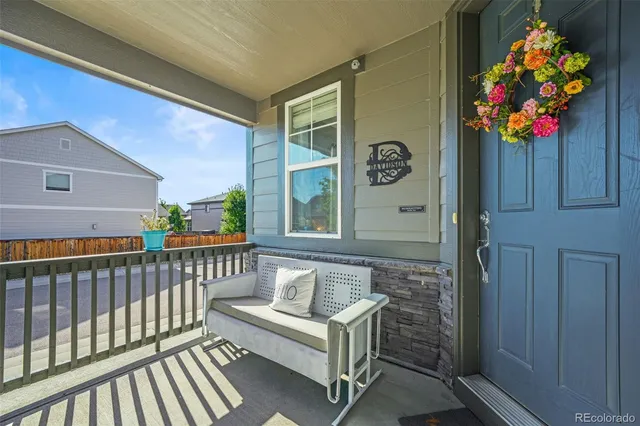 a view of a porch with furniture