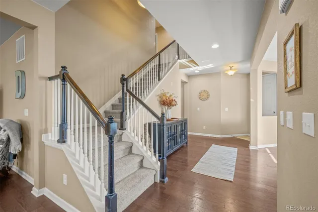 a view of entryway with wooden floor