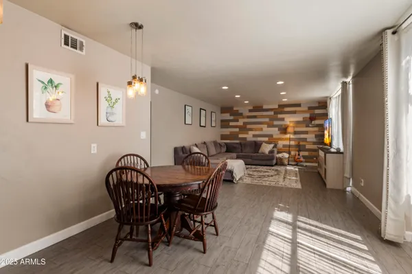 a view of a dining room with furniture
