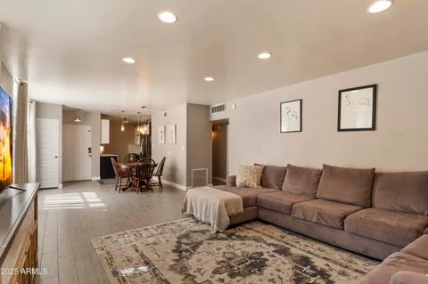 a living room with furniture and a couch