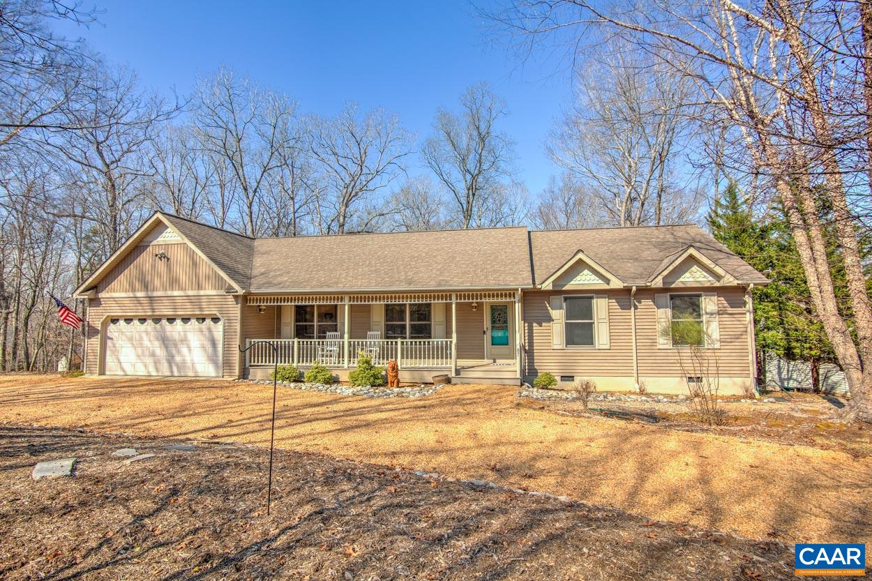 87 Laguna Road Palmyra, VA 22963 - Photo 1 of 38 a front view of a house with a yard