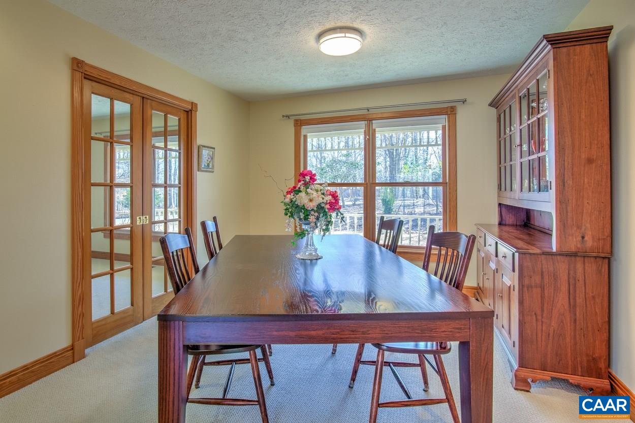 87 Laguna Road Palmyra, VA 22963 - Photo 12 of 38 a view of a dining room with furniture and window
