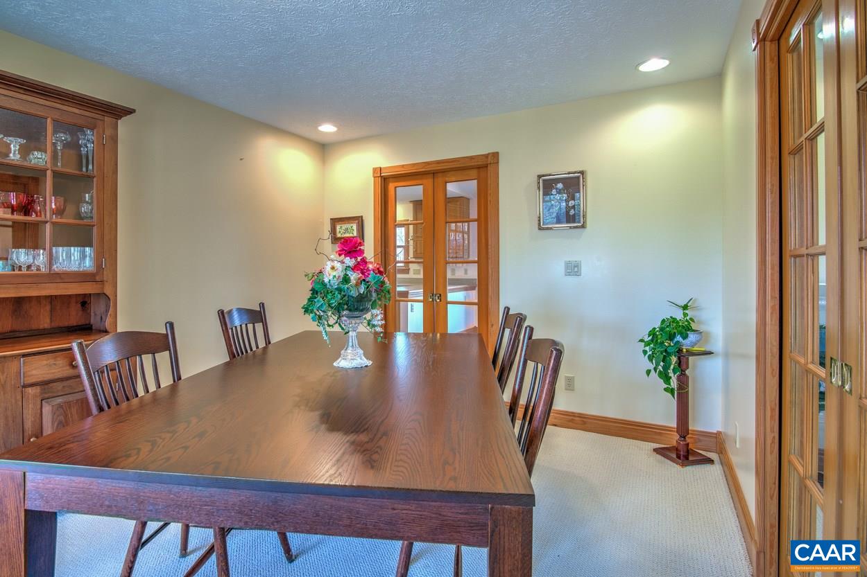 87 Laguna Road Palmyra, VA 22963 - Photo 13 of 38 a view of a dining room with furniture and wooden floor