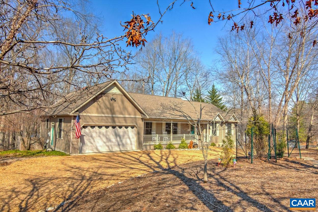 87 Laguna Road Palmyra, VA 22963 - Photo 2 of 38 a view of a house with a patio