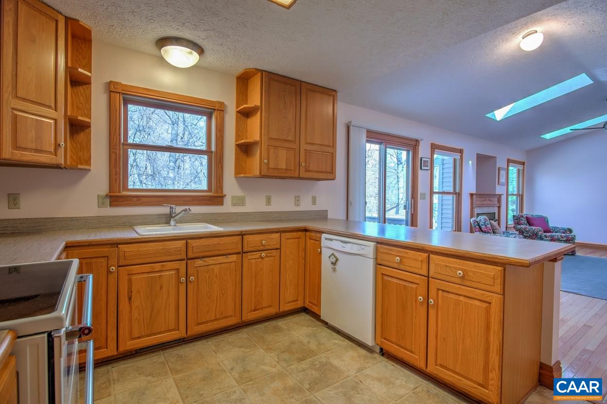 87 Laguna Road Palmyra, VA 22963 - Photo 7 of 38 a kitchen with a sink cabinets and window