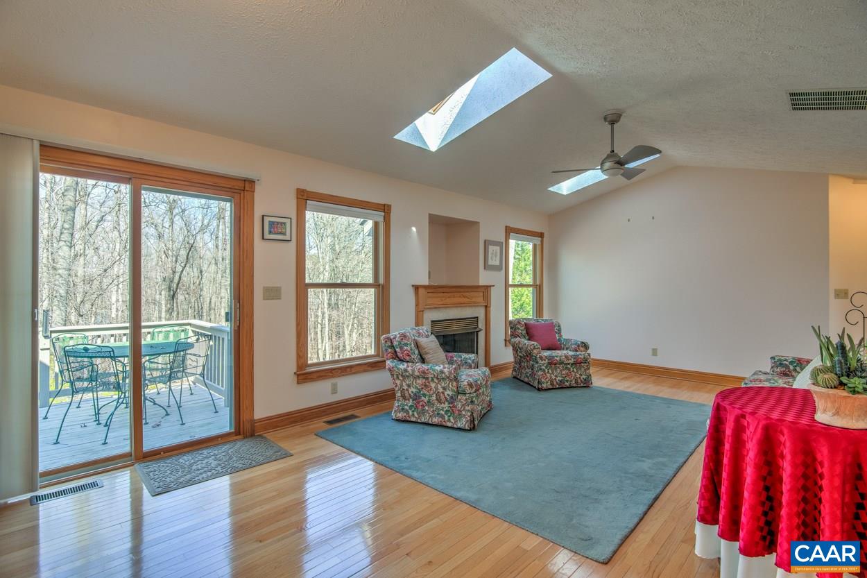 87 Laguna Road Palmyra, VA 22963 - Photo 8 of 38 a living room with furniture and wooden floor