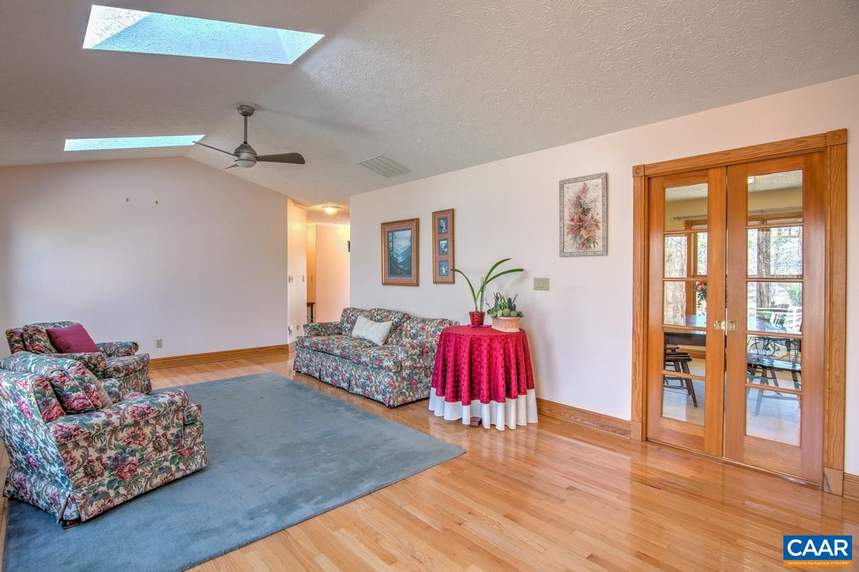 87 Laguna Road Palmyra, VA 22963 - Photo 10 of 38 a living room with furniture and wooden floor
