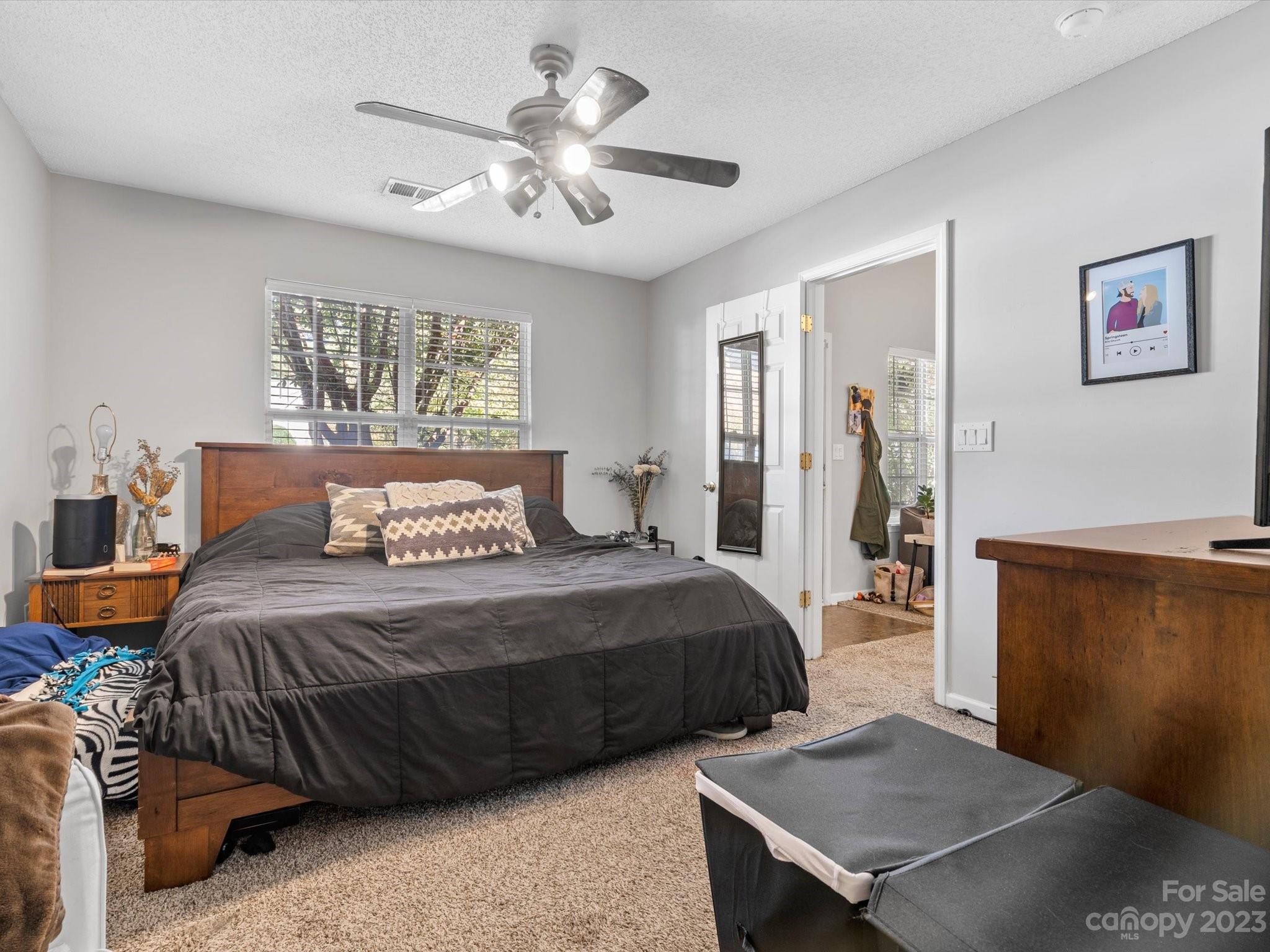 8162 Rudolph Road Charlotte, NC 28216 - Photo 4 of 17 a bedroom with a bed and window