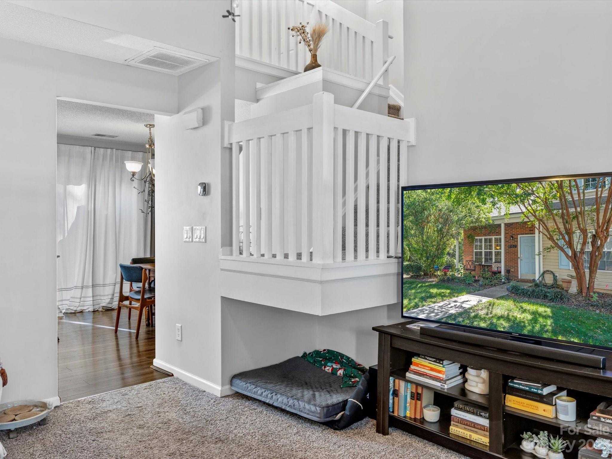 8162 Rudolph Road Charlotte, NC 28216 - Photo 7 of 17 a view of entryway and hall with wooden floor